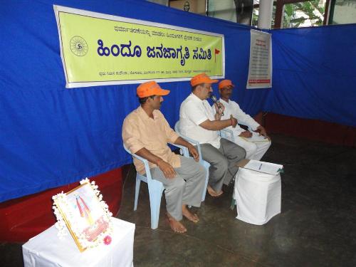 Mr. Vijay Kumar, Mr. Ravindra Kamat and Mr. Vishwanath addressing the audience.